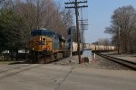 Coming across the old GTW, LSRC's Y117 crew rolls north on the Saginaw Sub with an empty grain train